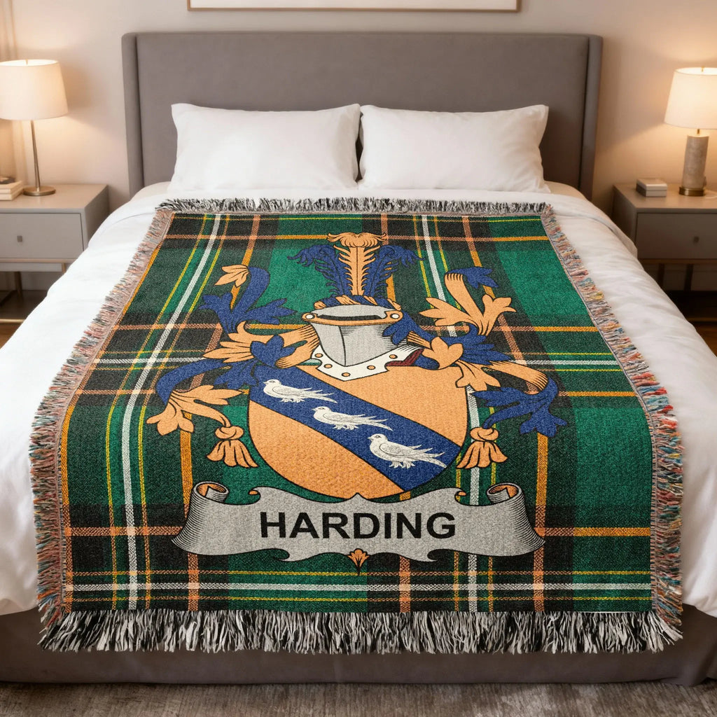 Plaid throw blanket featuring a family crest with the name Harding.