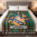 Plaid throw blanket featuring a family crest with the name Harding.