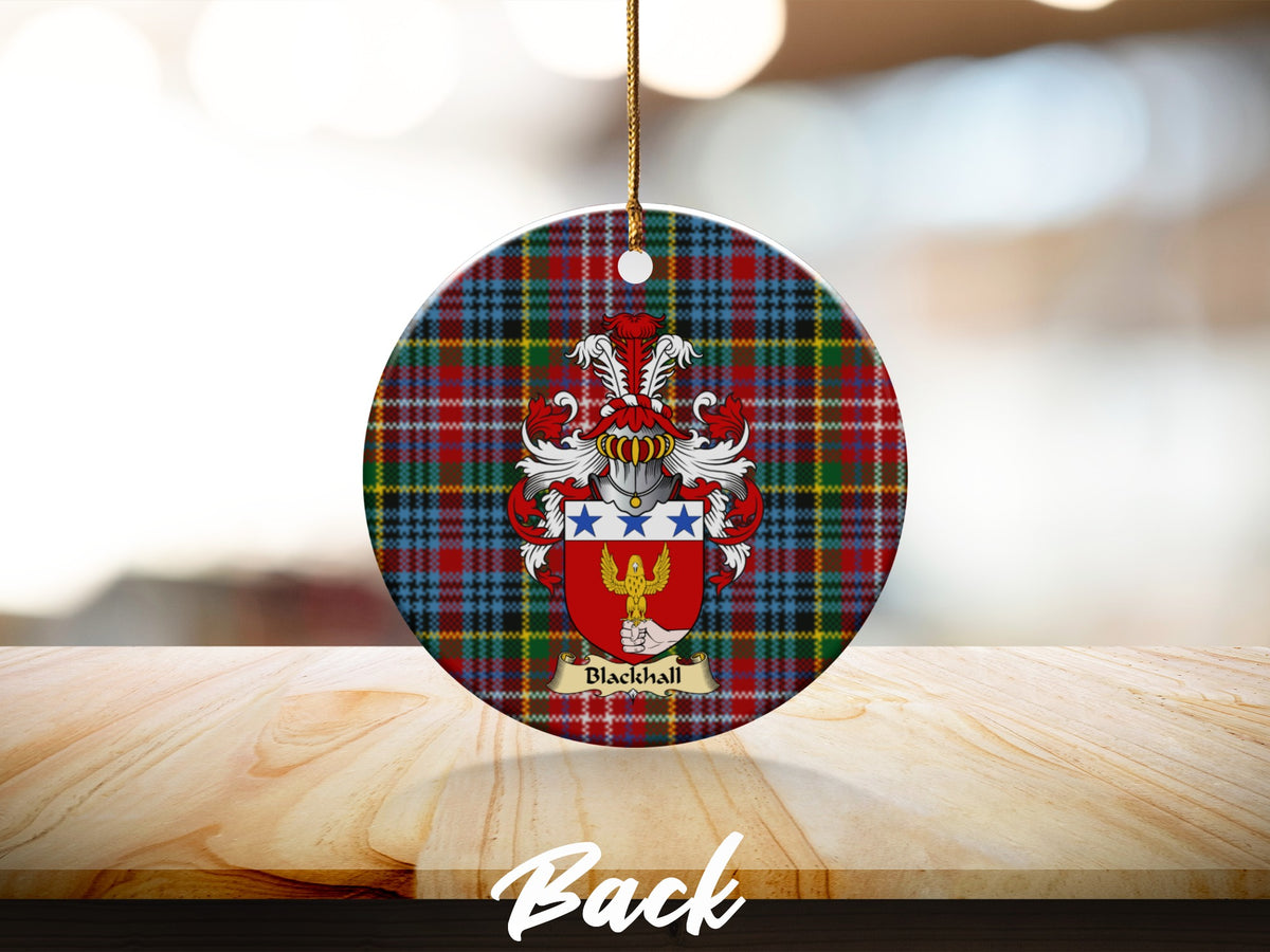 Round Blackhall Scottish clan ornament with family crest on a Caledonia tartan background