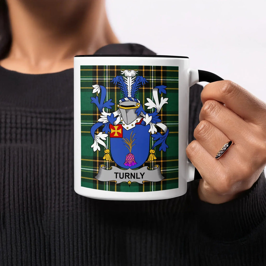 Mug featuring the Turnly family crest on a tartan background.