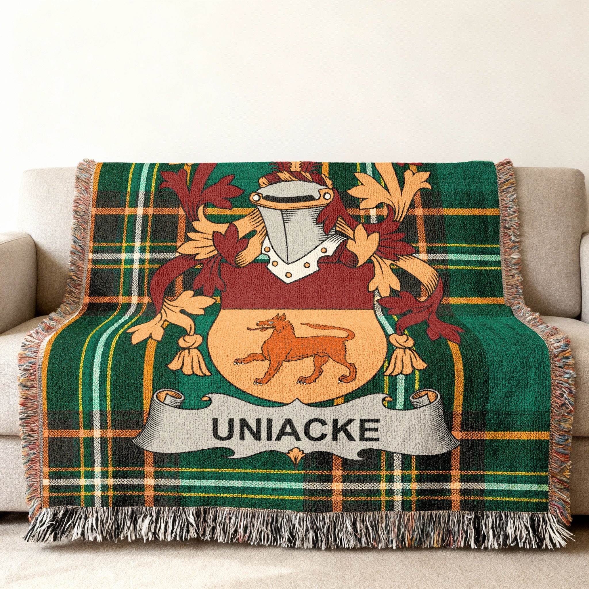 Tartan blanket with Uniacke family crest featuring a lion rampant.