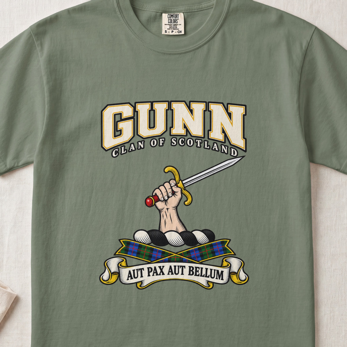 Gunn graphic T-shirt in Moss green, front flat lay showing varsity lettering and hand and forearm holding a straight silver sword with gold guard and red pommel.