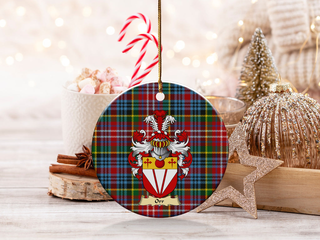 Double-sided Orr ceramic ornament with family shield and Caledonia tartan background