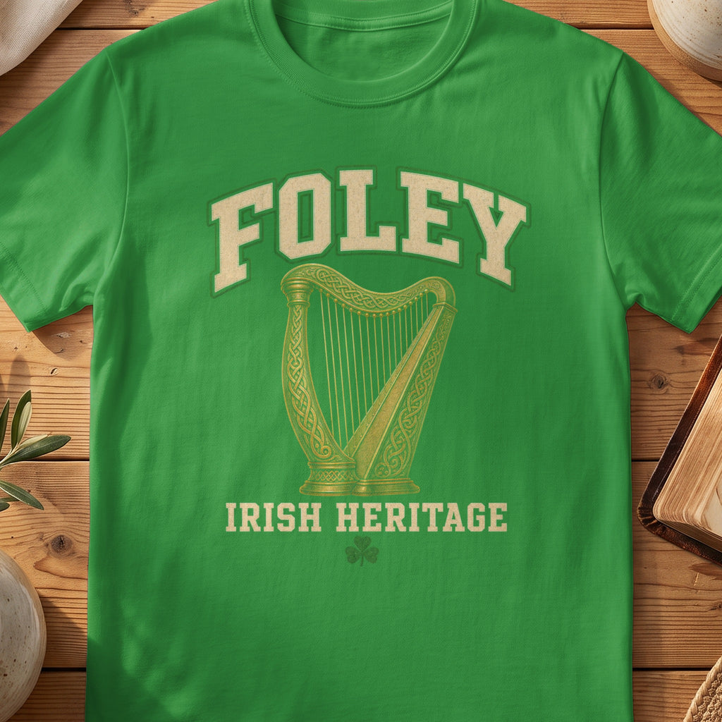 Foley Irish harp T-shirt in Irish Green, with cream surname lettering, a gold-toned harp, green shamrock and “Irish Heritage” text.