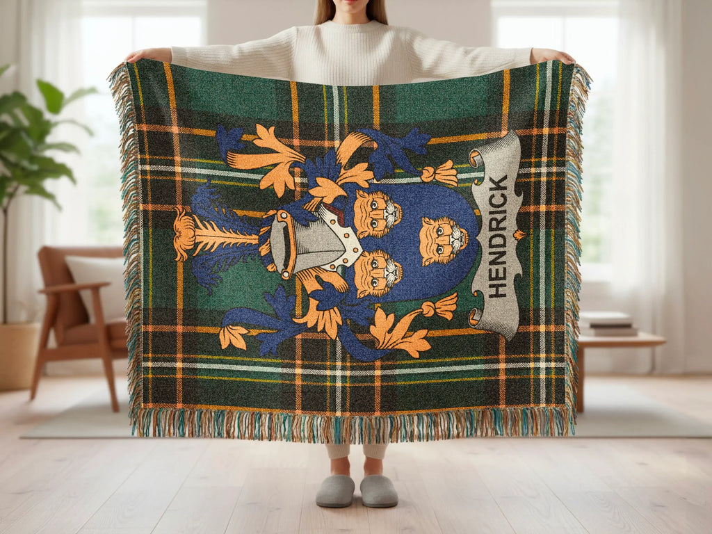 Green tartan throw blanket with Hendrick family crest displayed.