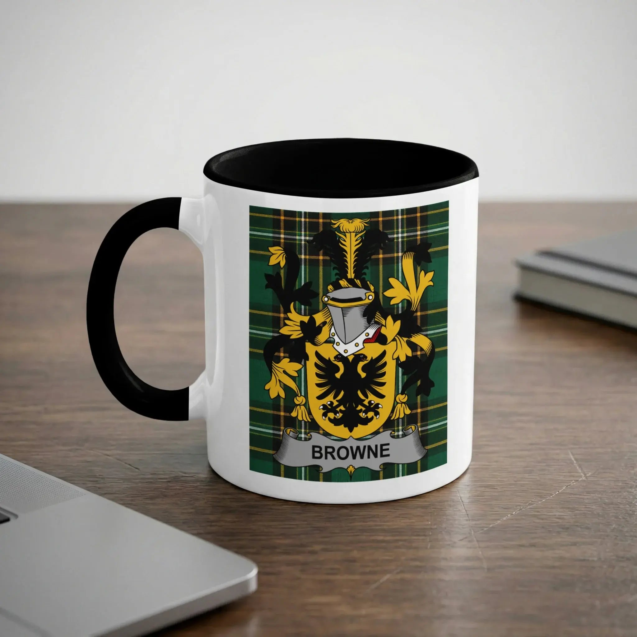 Mug with black handle and rim featuring the Browne family crest with a gold eagle.