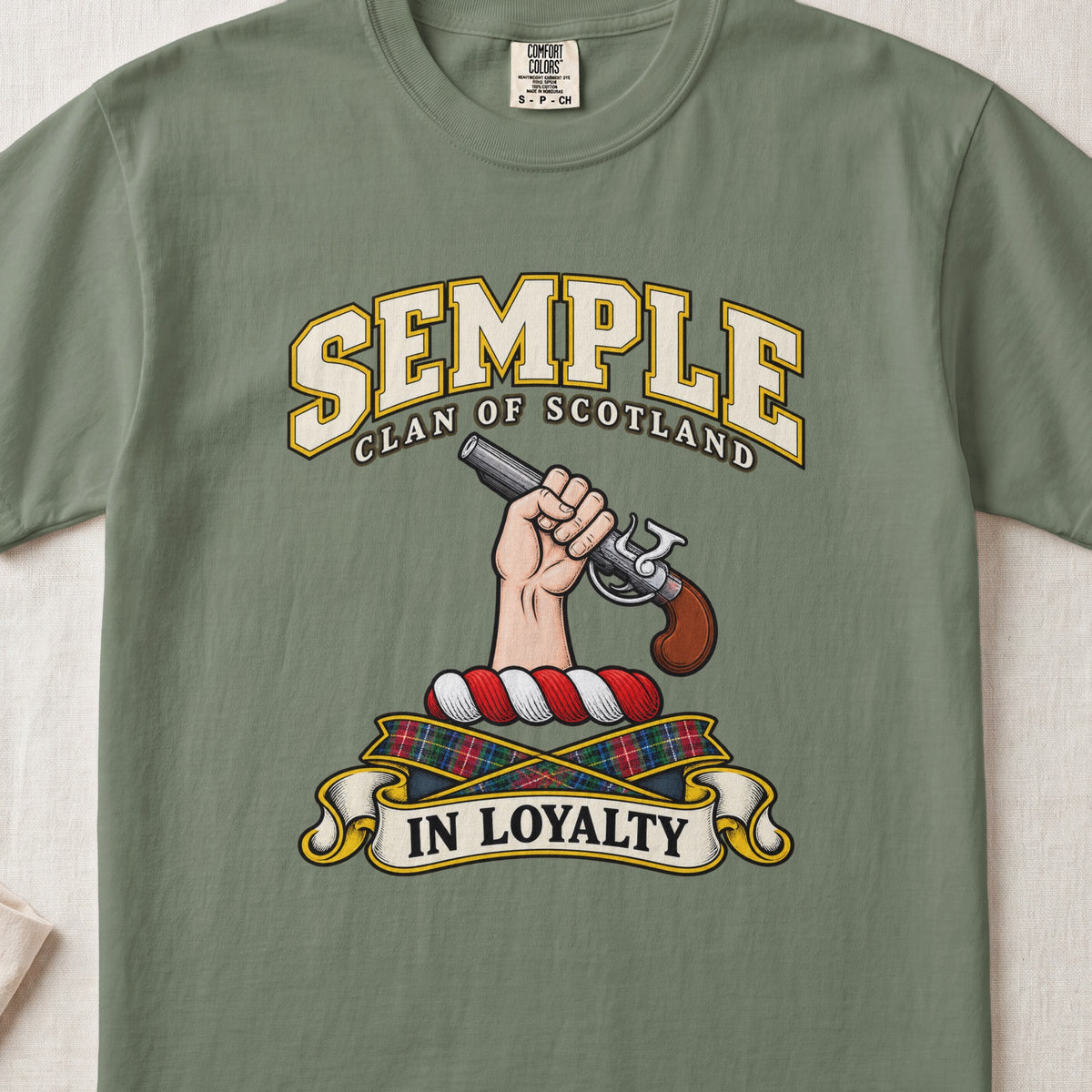 Semple Scottish clan T-shirt in Moss, front view with a hand holding a flintlock pistol and motto banner.