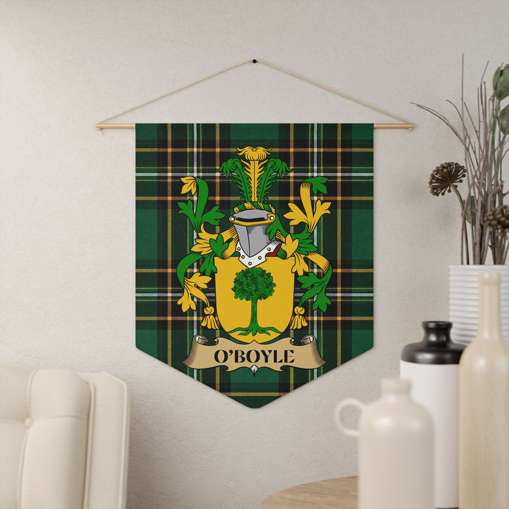 O'Boyle coat of arms on green plaid banner with gold tree emblem.