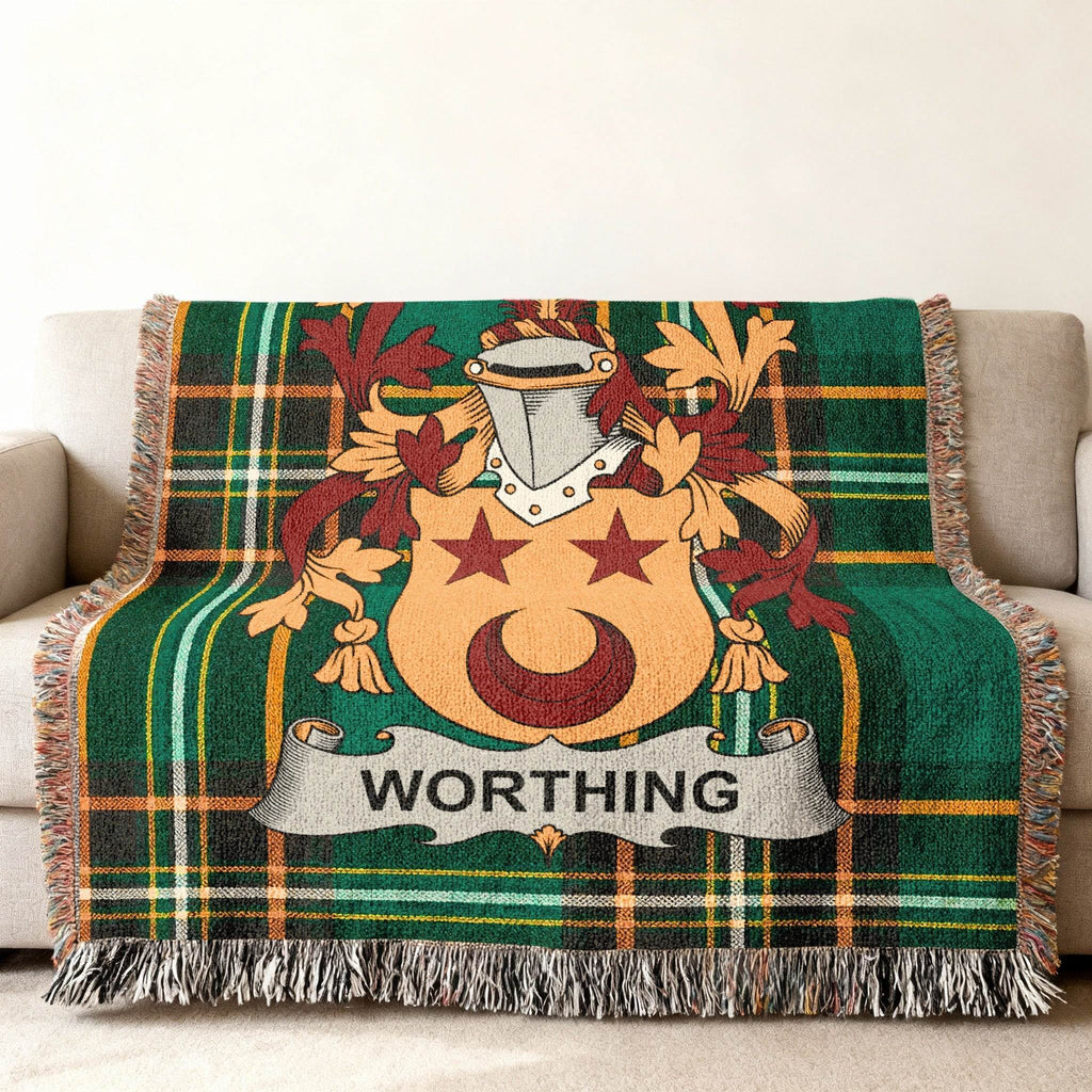 Tartan blanket with Worthing family crest featuring stars and shield.