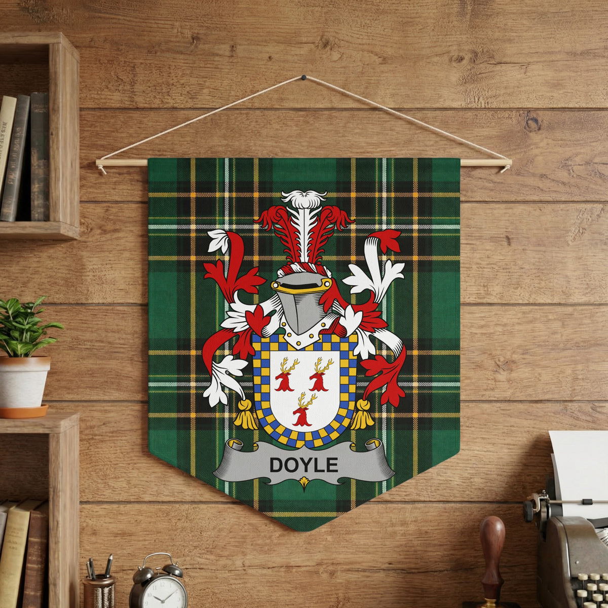 Doyle family crest banner on green tartan fabric hanging on wood wall.