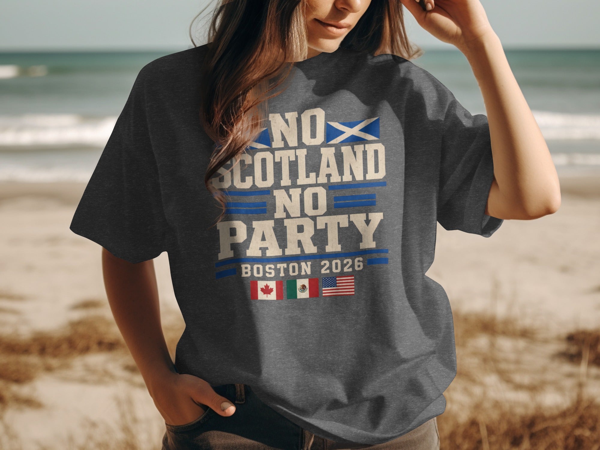 Dark gray t-shirt with "Scotland No Party Boston 2026" text and flag graphics.