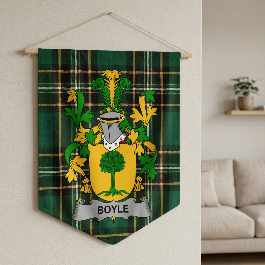 Boyle family crest on a green tartan pennant hanging on a wall.