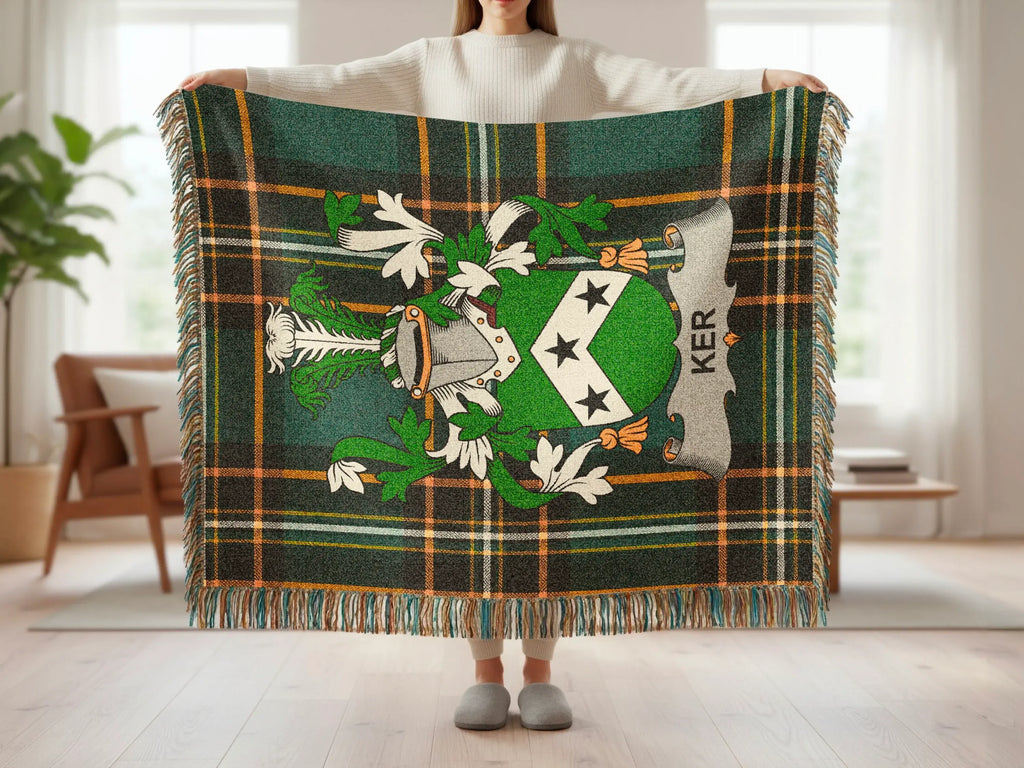 Tartan blanket featuring a green, black, and gold plaid pattern with a coat of arms and "KER" text.