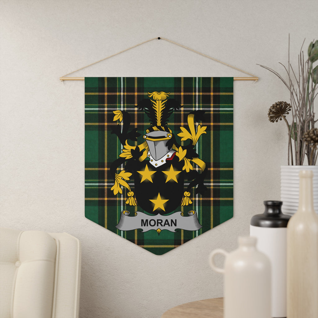Moran family crest pennant with laser-cut edges hanging in a room
