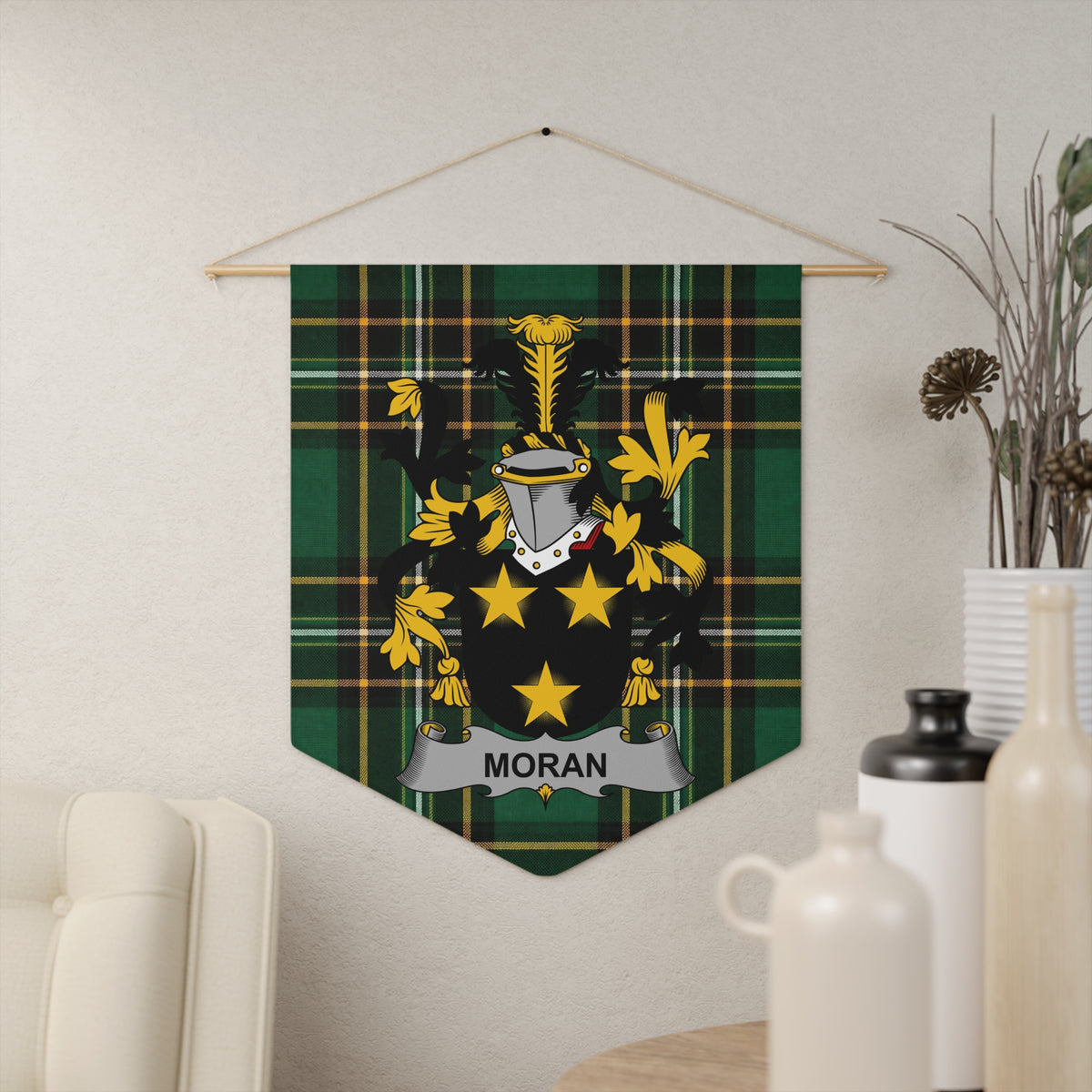Moran family crest pennant with laser-cut edges hanging in a room