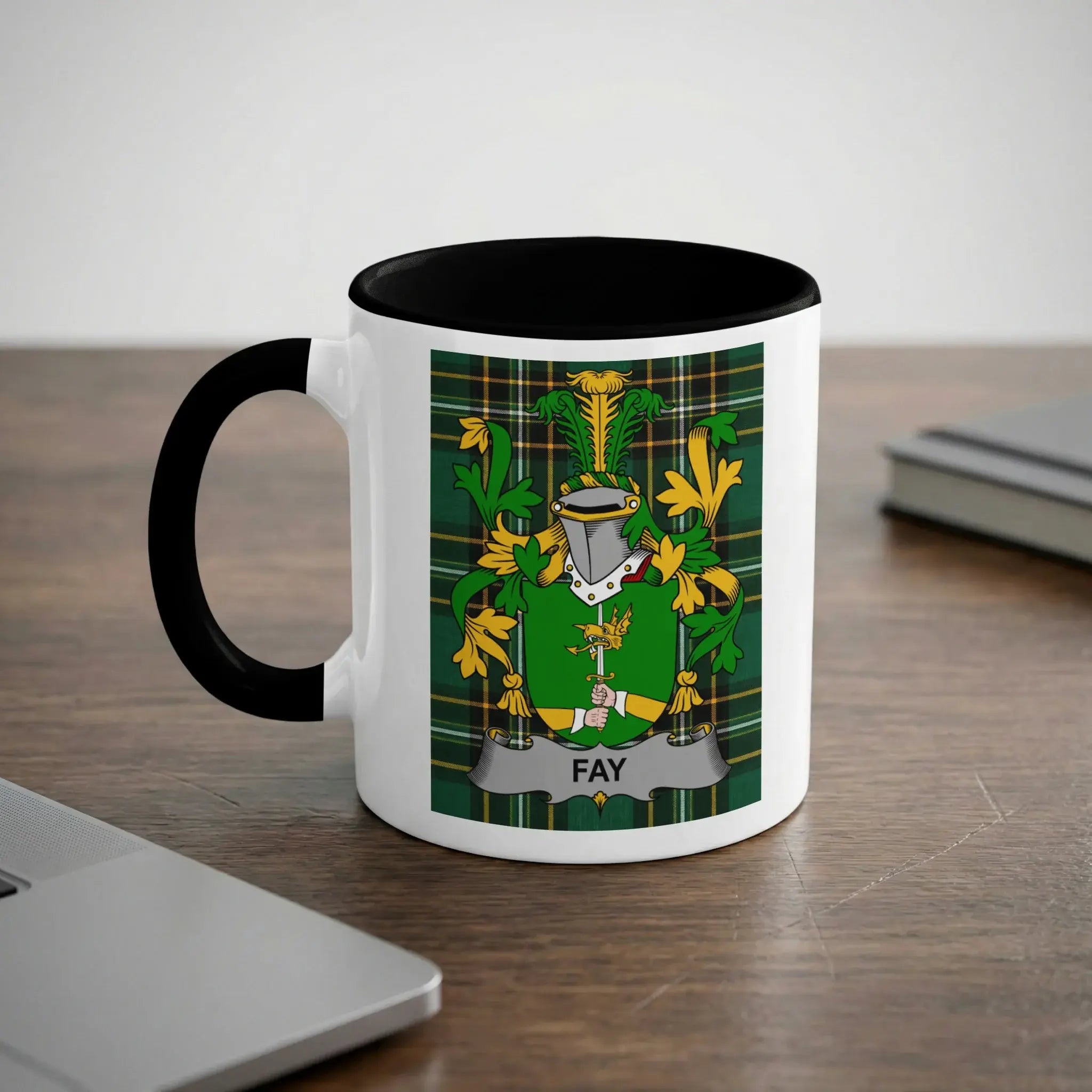 White mug with black rim featuring the Fay family crest.