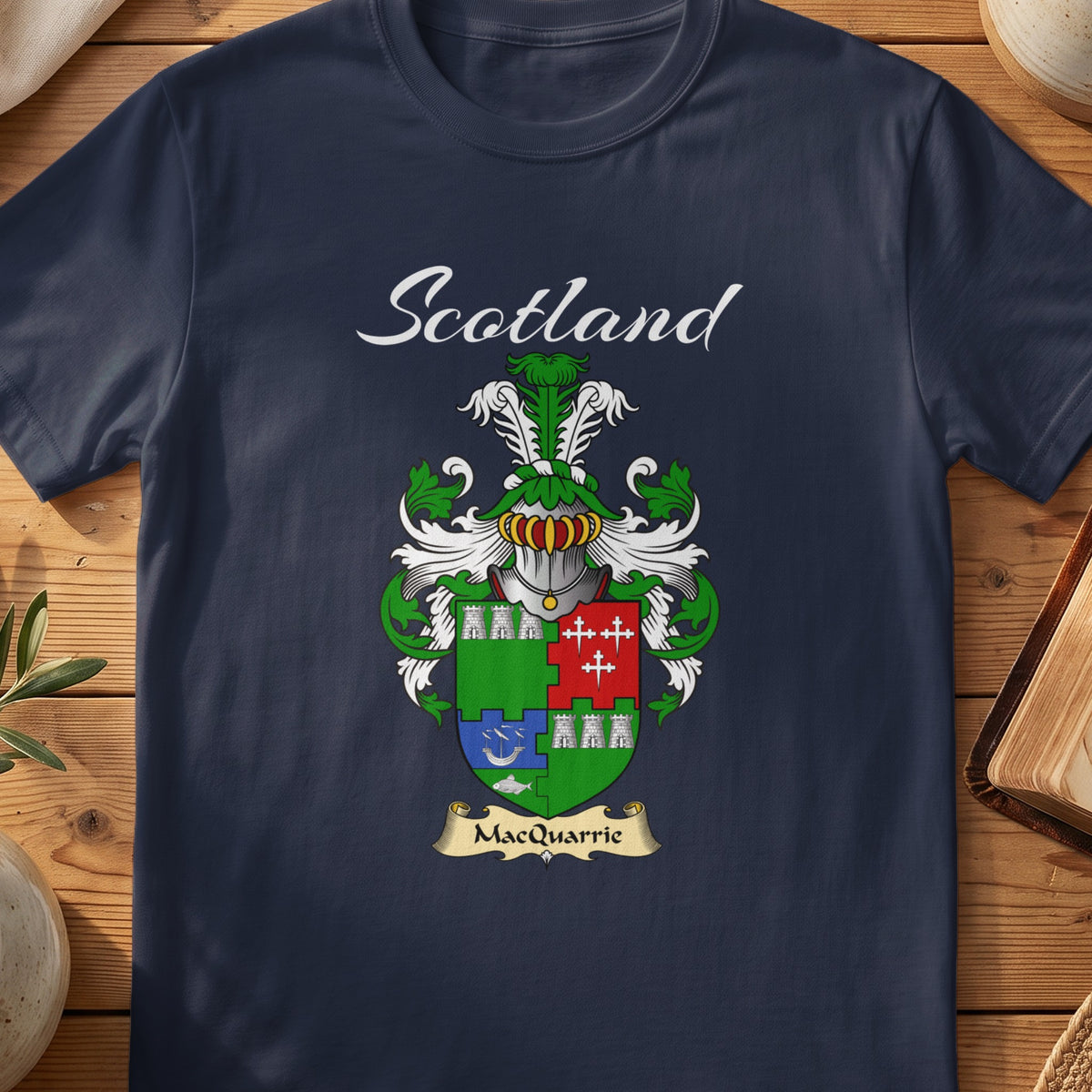 Navy MacQuarrie family shield T-shirt featuring a green shield with contrasting coloured quarters