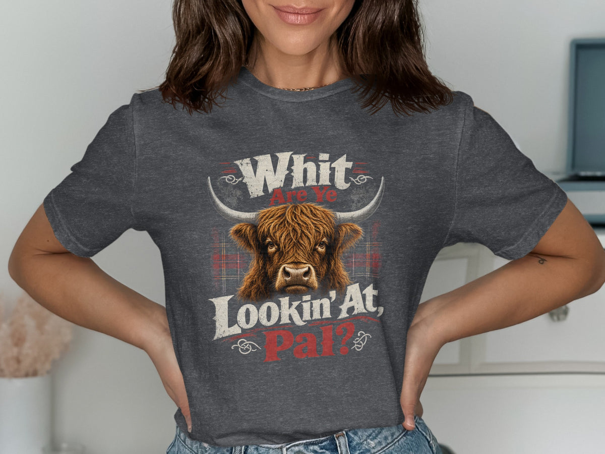 Highland cow graphic with text "Whit Are Ye Lookin' At, Pal?" on a grey t-shirt.