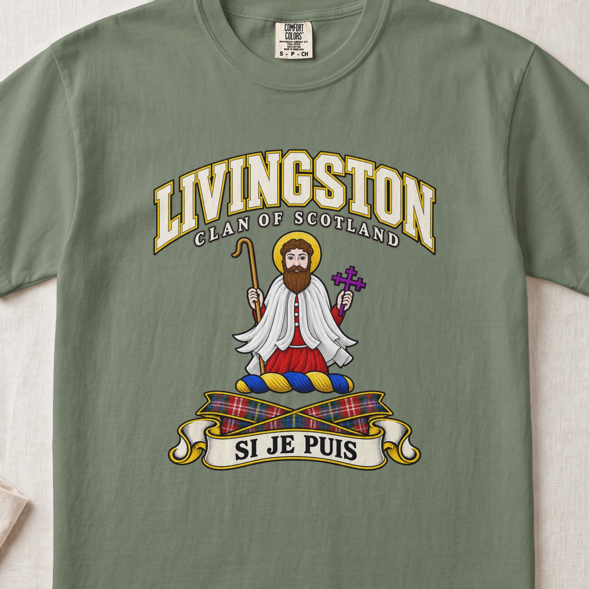 Livingston Scottish clan T-shirt in Moss, front view with a robed figure with a golden halo and motto design.