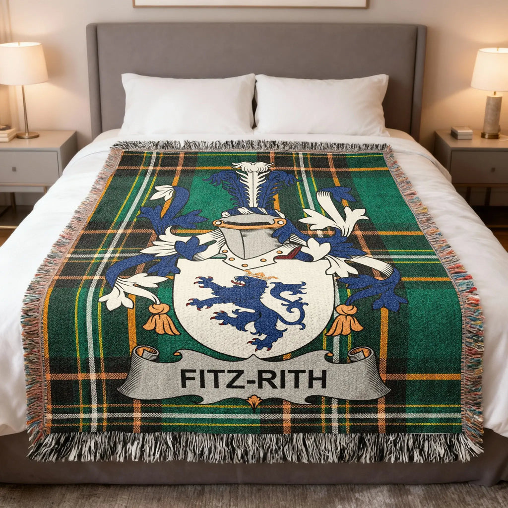 Fitz-Rith coat of arms on a green plaid woven throw blanket on a bed.