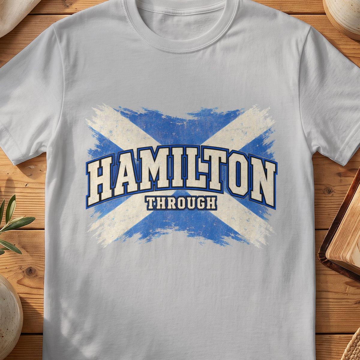 Hamilton Scottish Saltire T-shirt in Sport Grey, with distressed blue and cream flag and “Through” lettering.