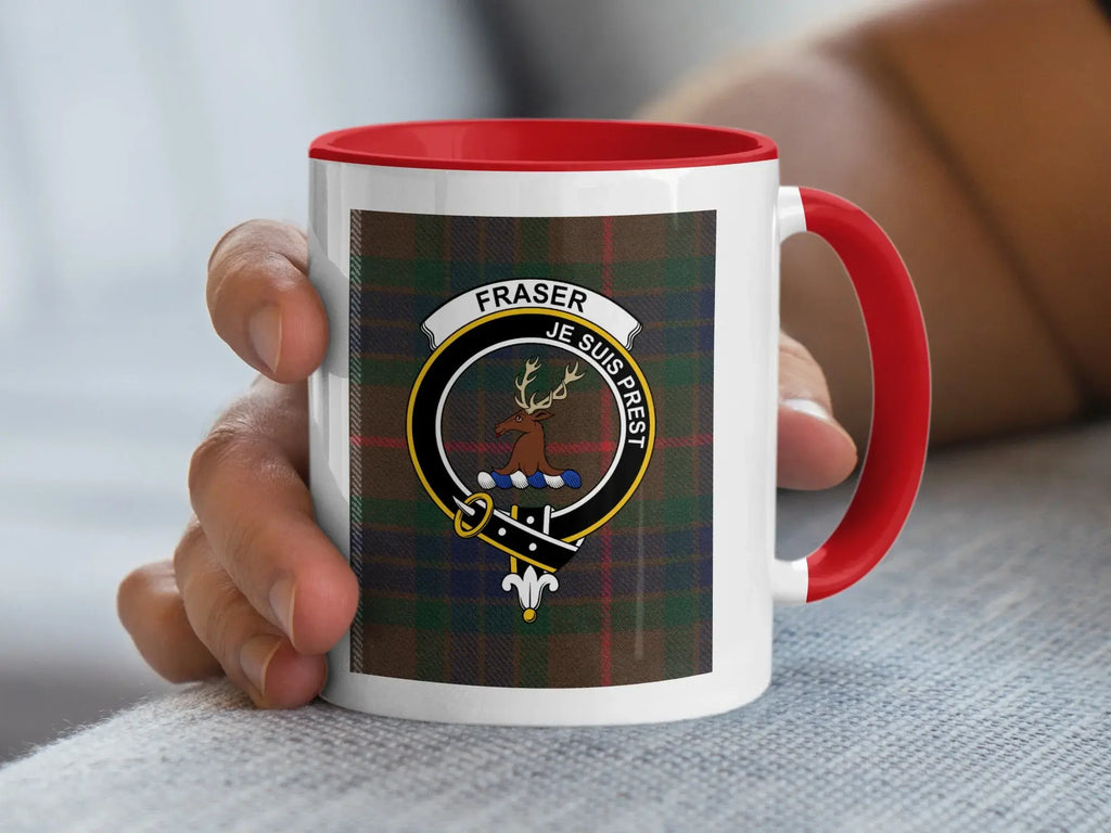 Fraser Je Suis Prest crest mug — close-up of clan emblem on red and black tartan, 11oz