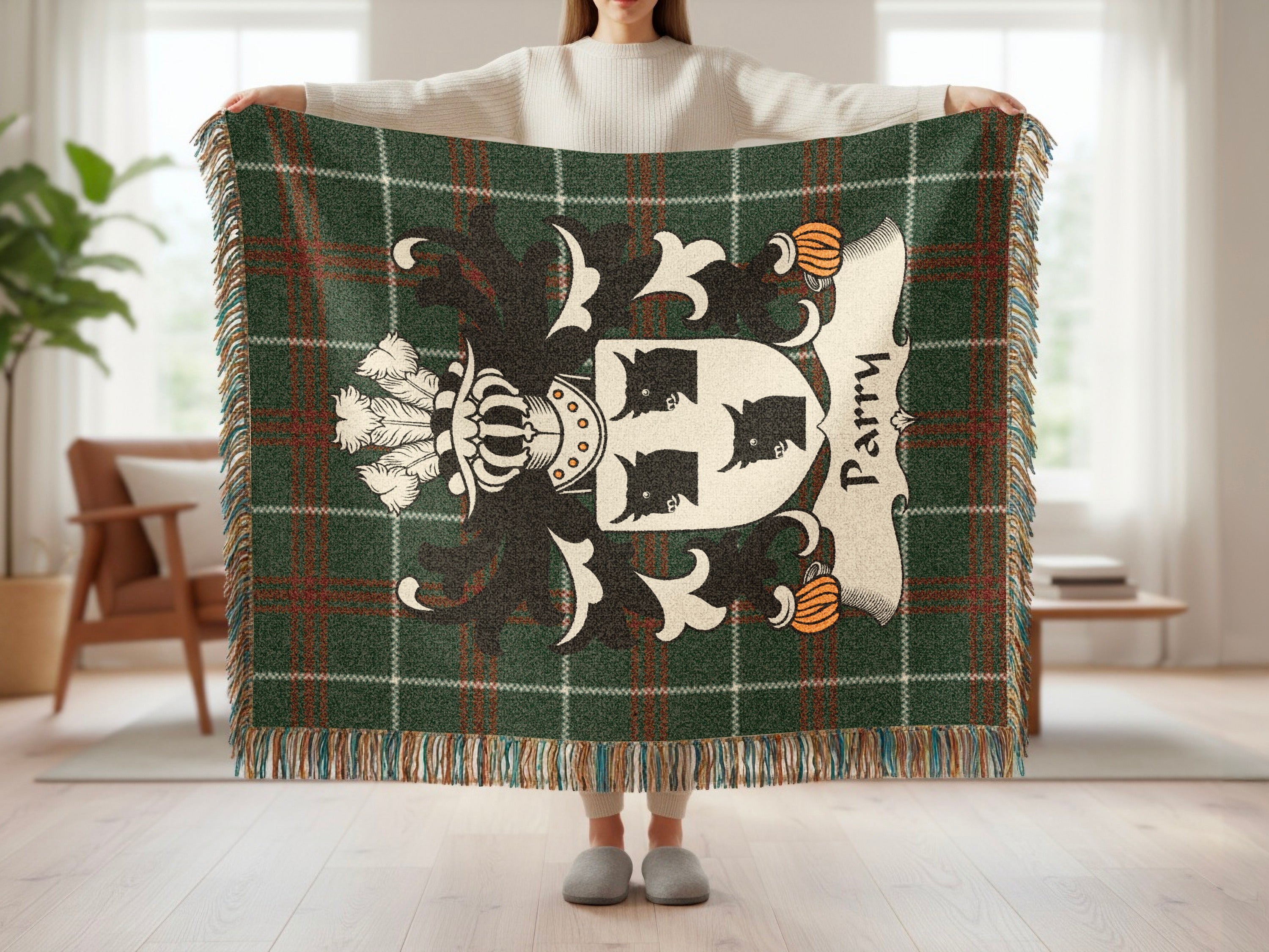 Green tartan blanket with a coat of arms featuring "Parry" text.