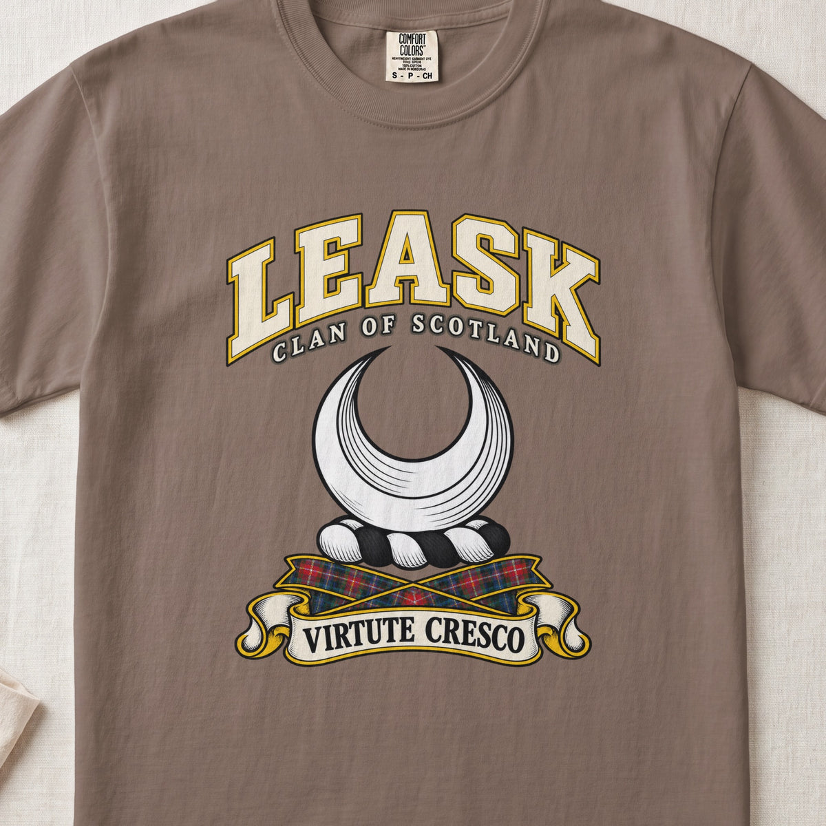 Leask Scottish clan T-shirt in Espresso, front view with a silver crescent and motto design.