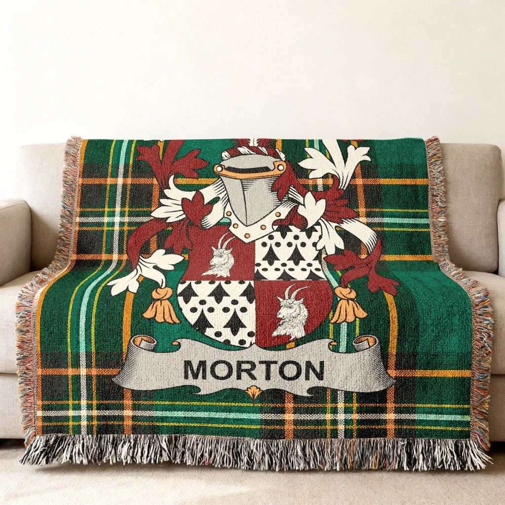 Green tartan blanket with the Morton family crest and name.