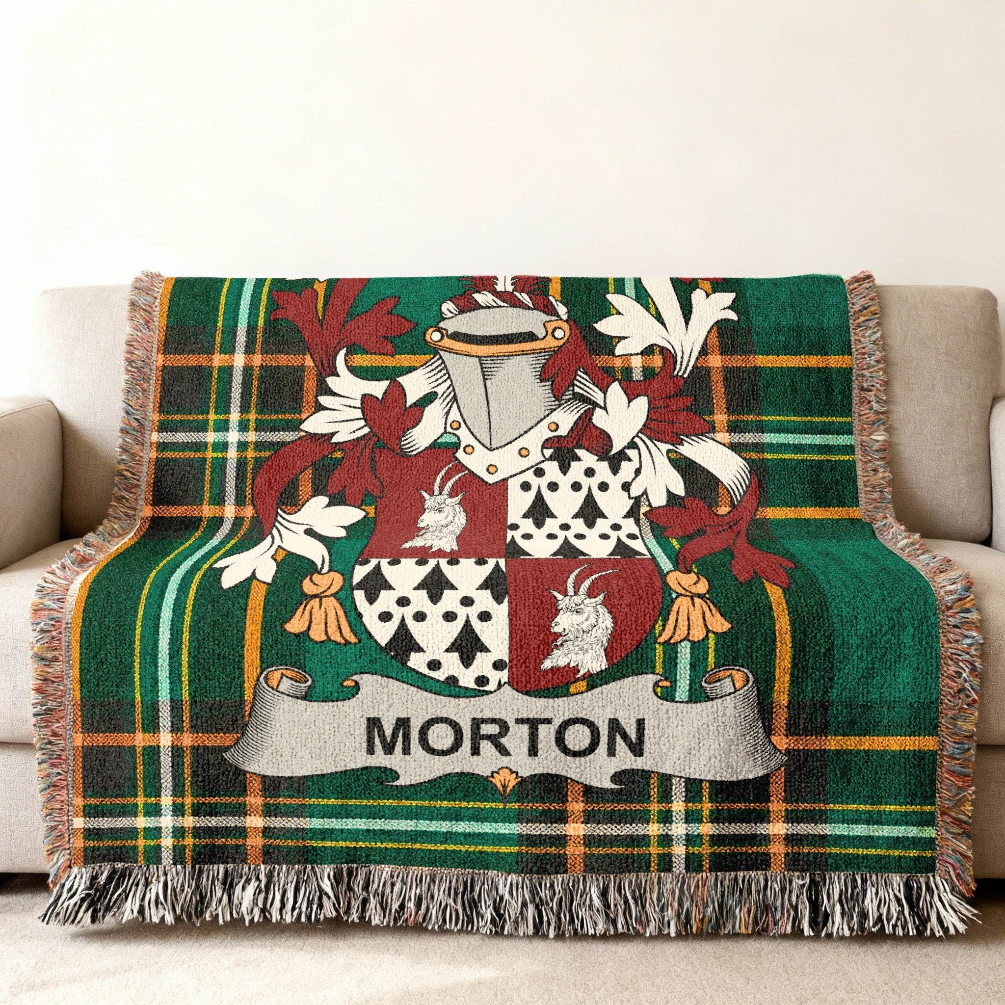 Green tartan blanket with the Morton family crest and name.