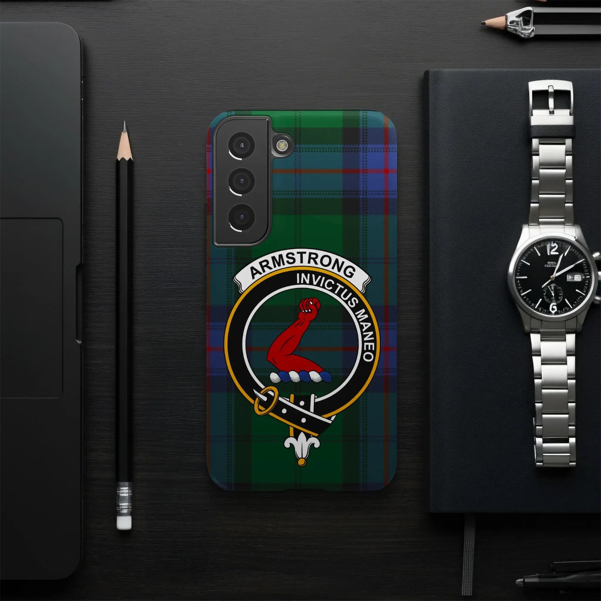 Armstrong Invictus Maneo crest phone case side view — slim profile, edge-to-edge tartan print