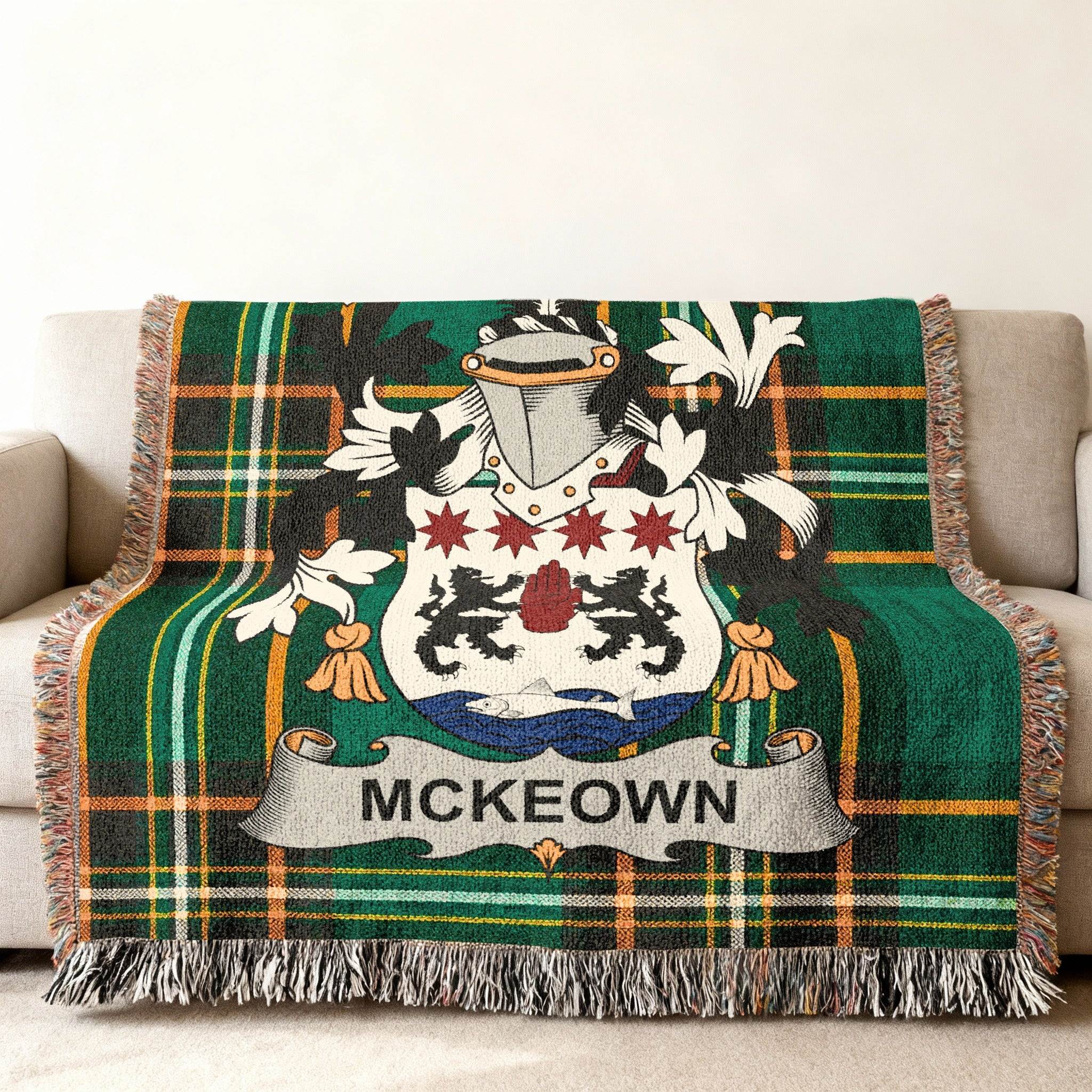 Green plaid throw blanket featuring the McKeown family crest.