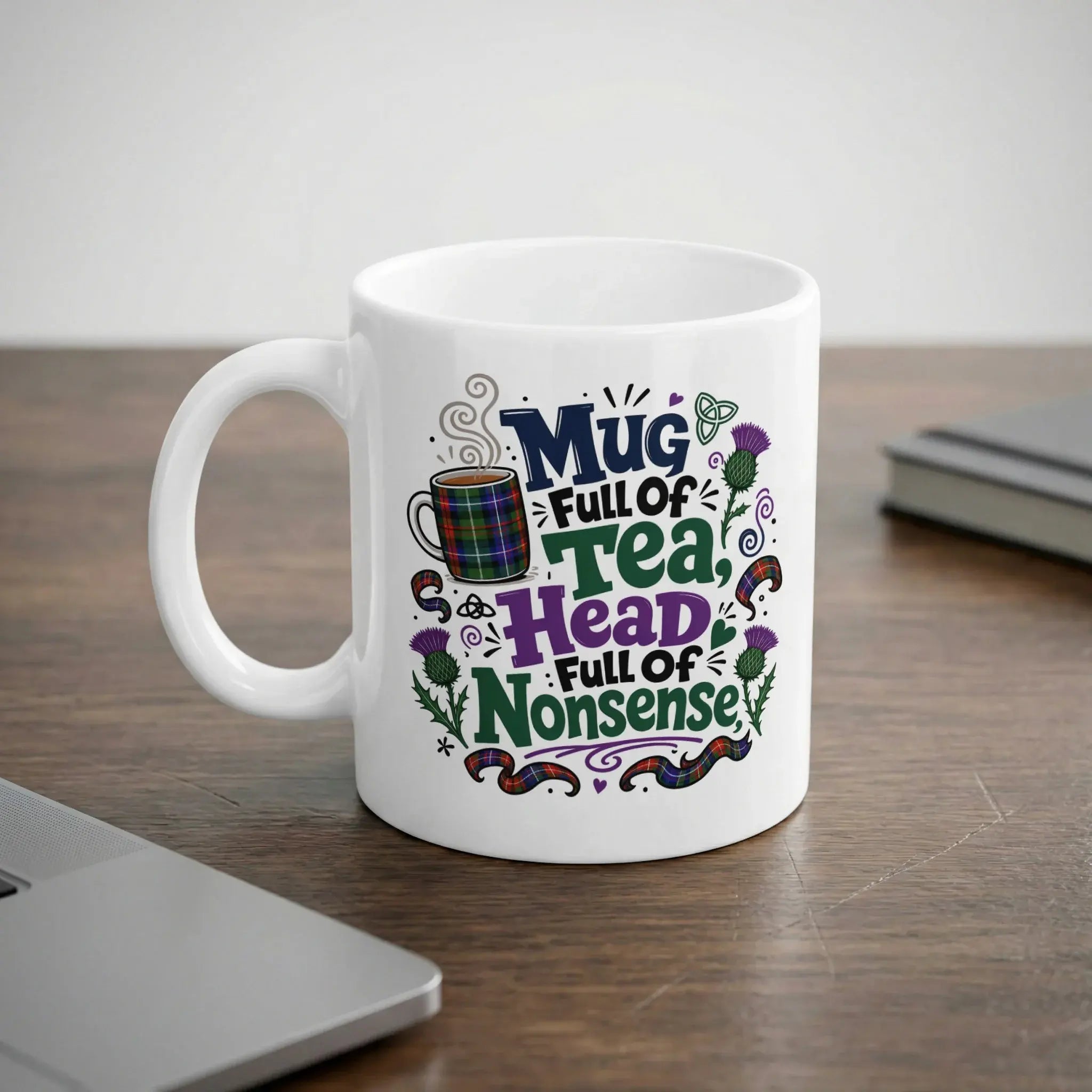 White mug with Scottish thistle and plaid design, text "Mug Full of Tea, Full of Nonsense".