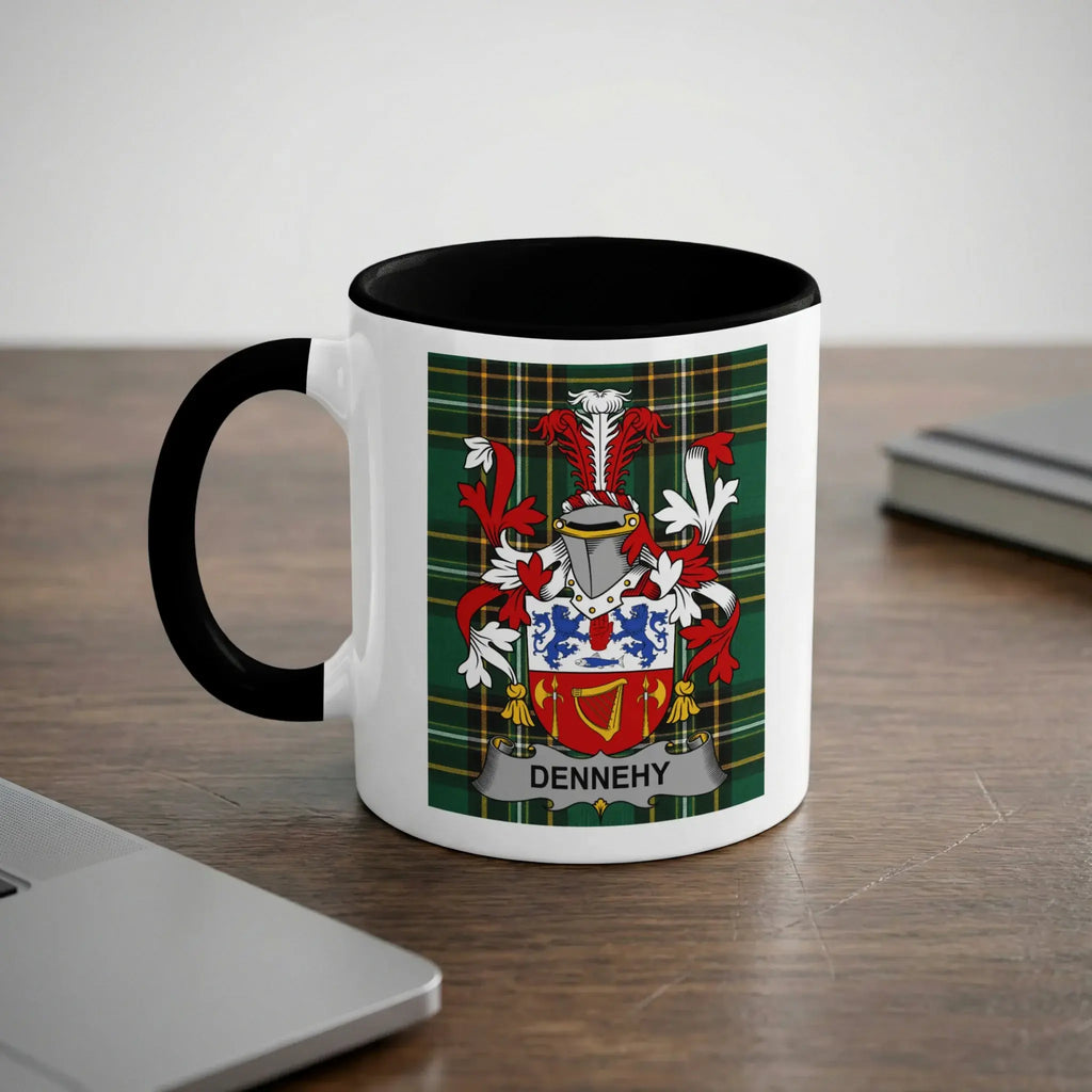 White mug with black handle featuring the DENNEHY family crest on a green plaid background.