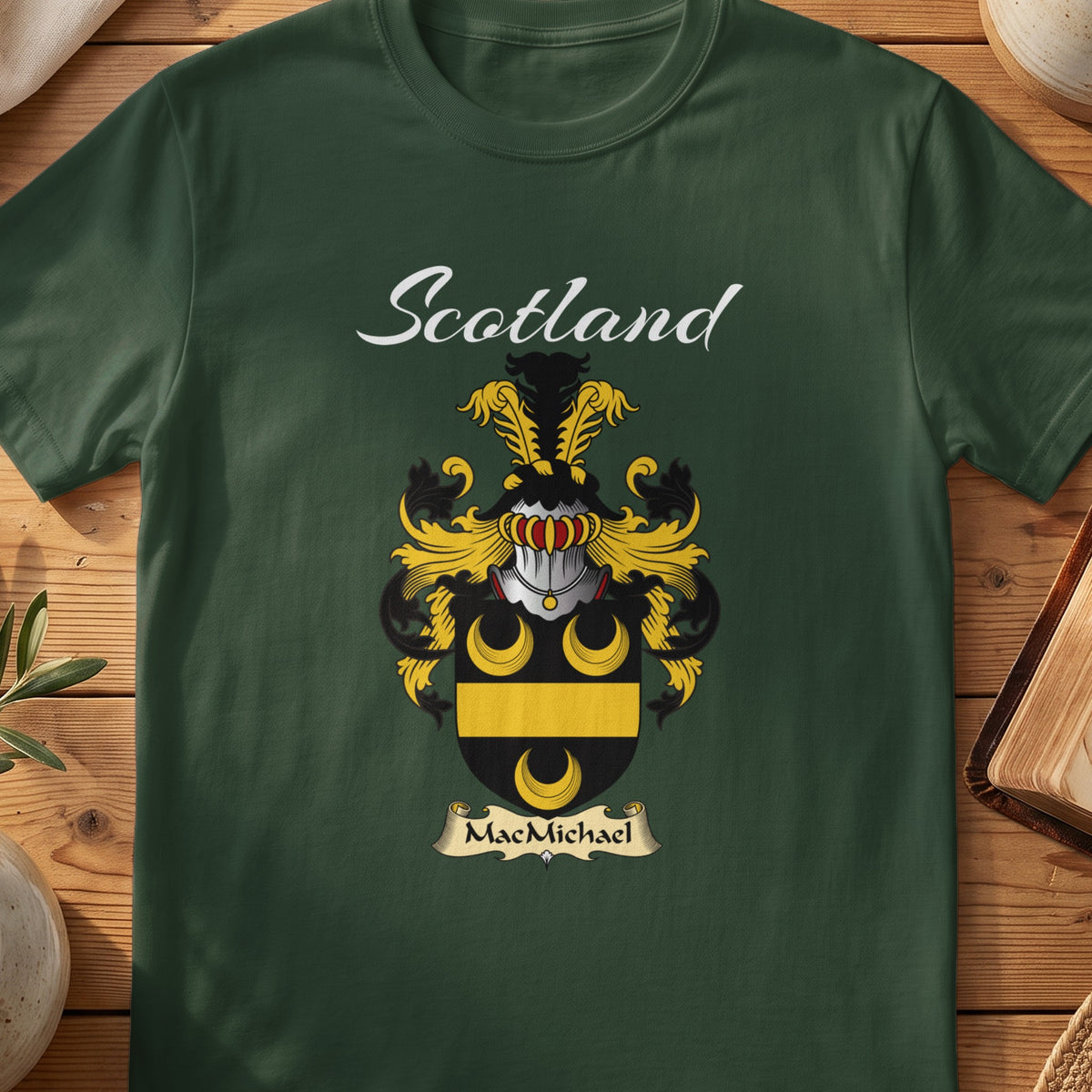Forest Green MacMichael Scottish T-shirt featuring gold crescents and a gold band on black