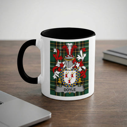 White mug with black rim featuring Doyle family crest and tartan pattern.