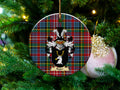 Roger Scottish clan ceramic ornament with family crest on a Caledonia tartan background, hanging on a Christmas tree