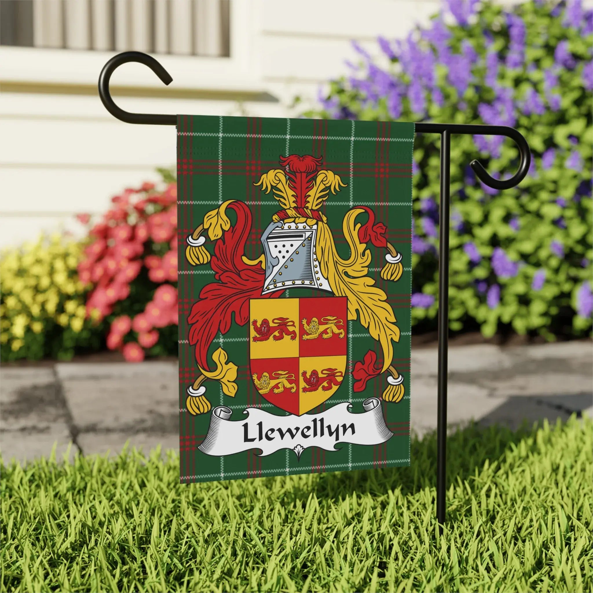Green tartan flag with Llewellyn coat of arms displayed on a stand outdoors.