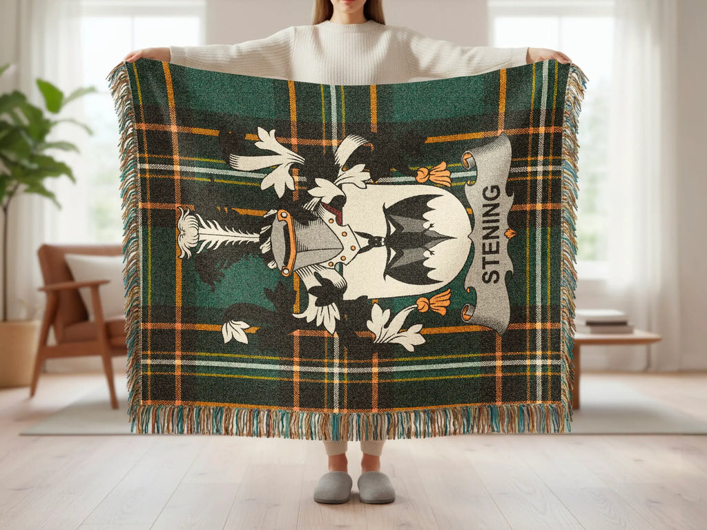Tartan blanket with coat of arms and "Stening" text.