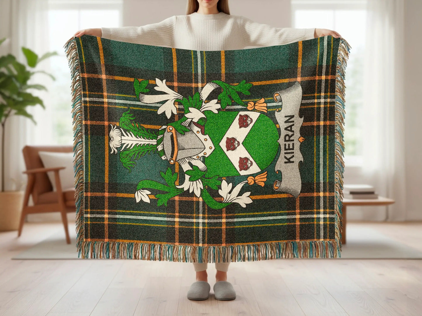 Green and gold tartan blanket with a crest featuring the name "Kieran".