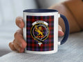 Broun family crest coffee mug with a tartan-background design