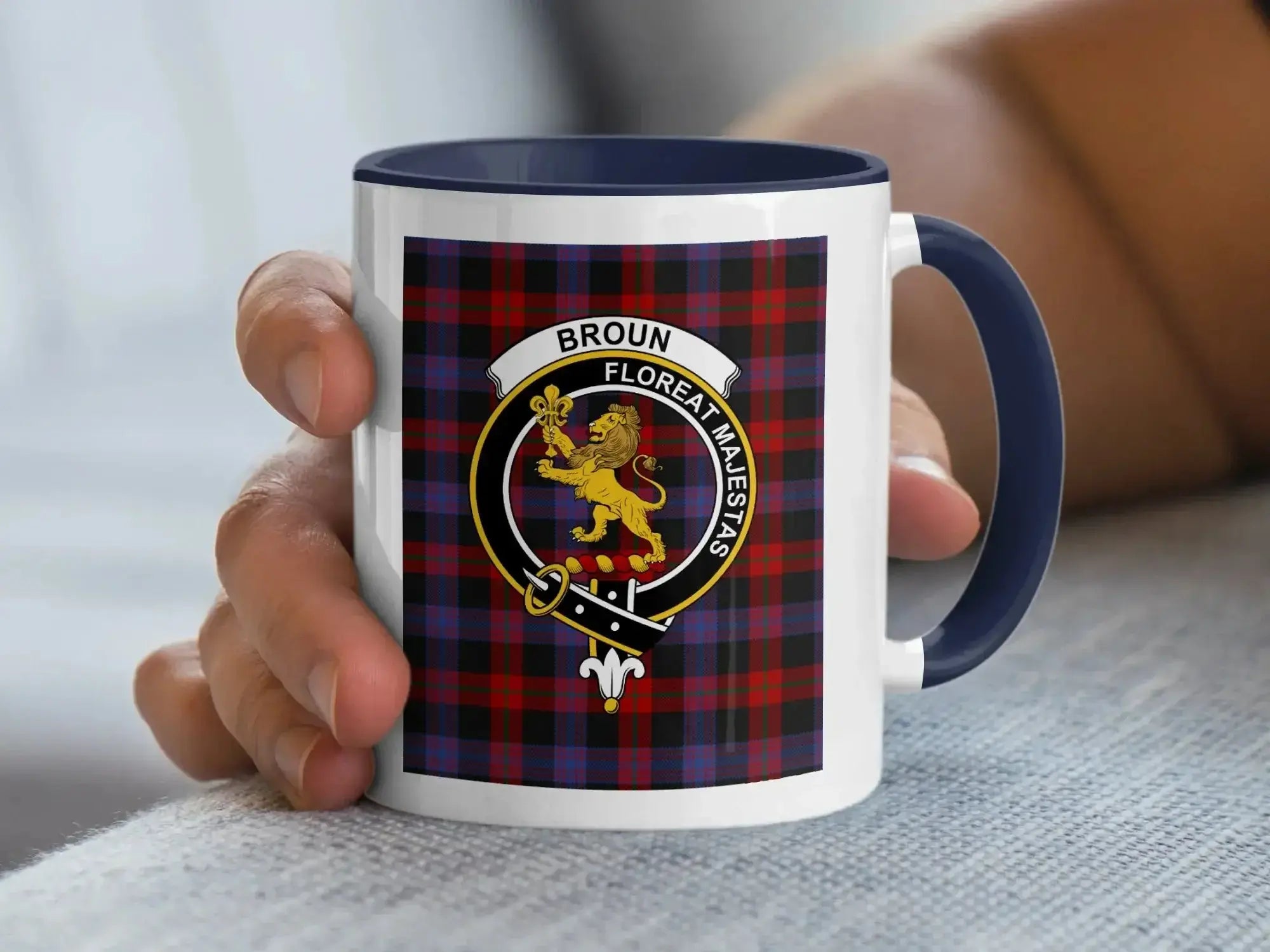 Broun family crest coffee mug with a tartan-background design