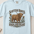 Scottish Roots, Highland Heart Highland cow design on a Chambray Comfort Colors 1717 T-shirt, flat lay