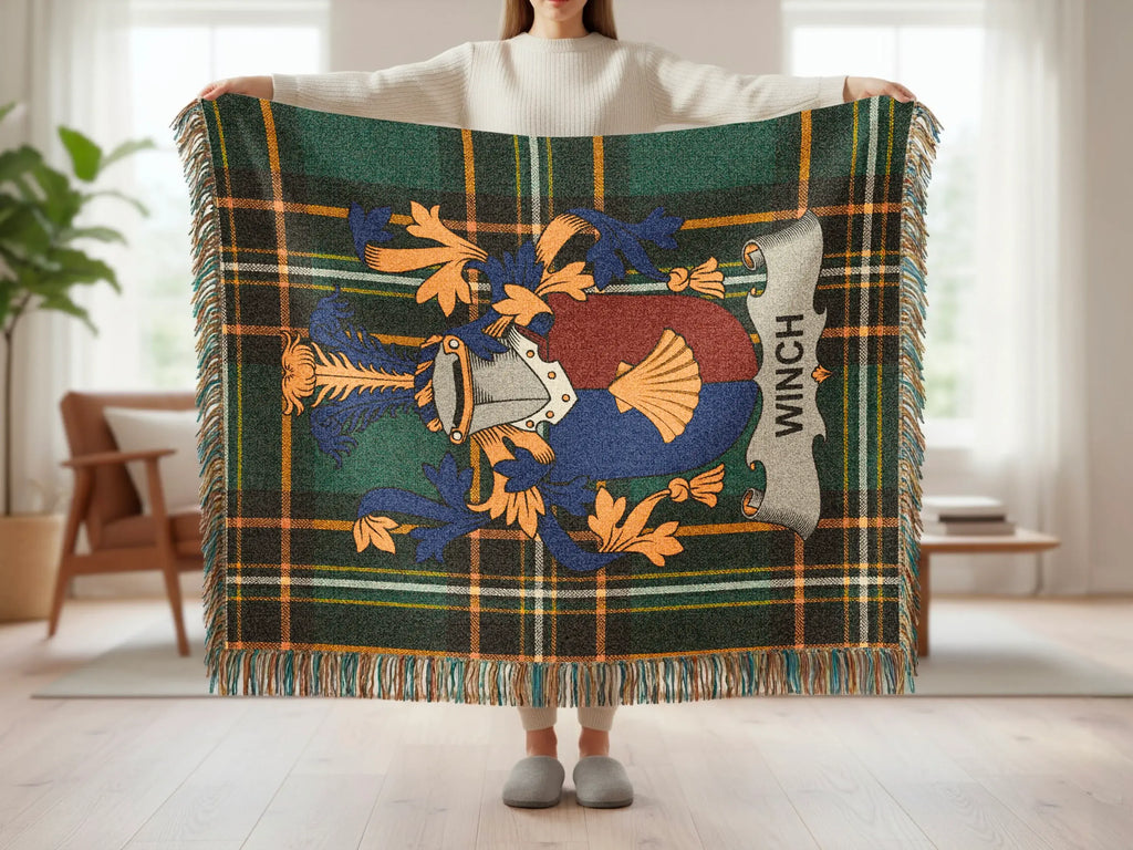 Tartan throw blanket with family crest and "Winch" name.