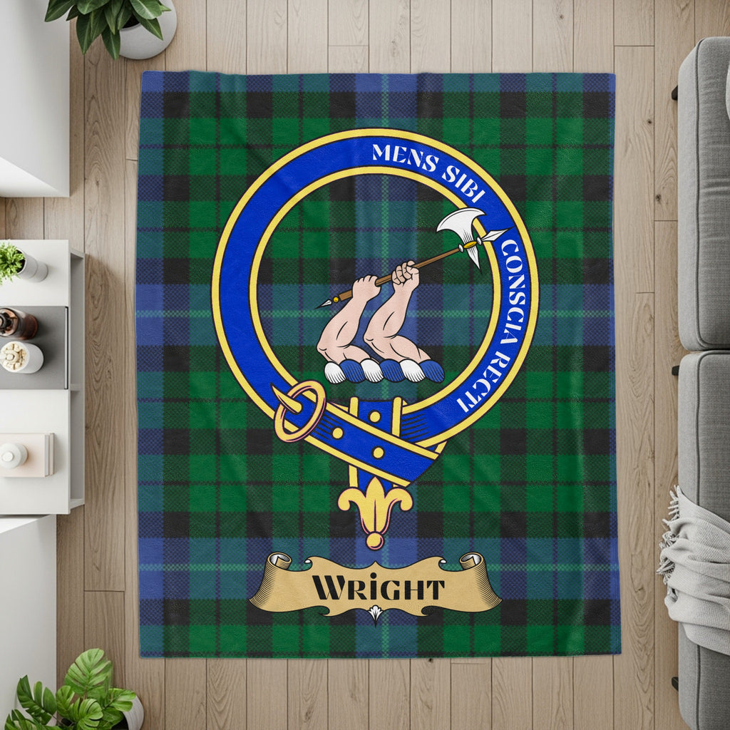 Wright crest with hands holding axe on tartan printed throw — detail