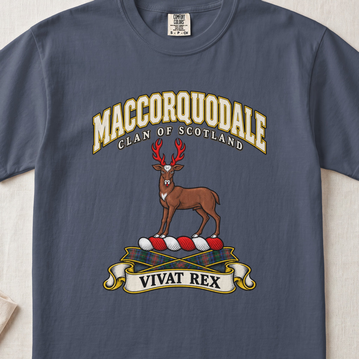 MacCorquodale Scottish clan T-shirt in Midnight, front view with a brown stag with antlers and motto banner.