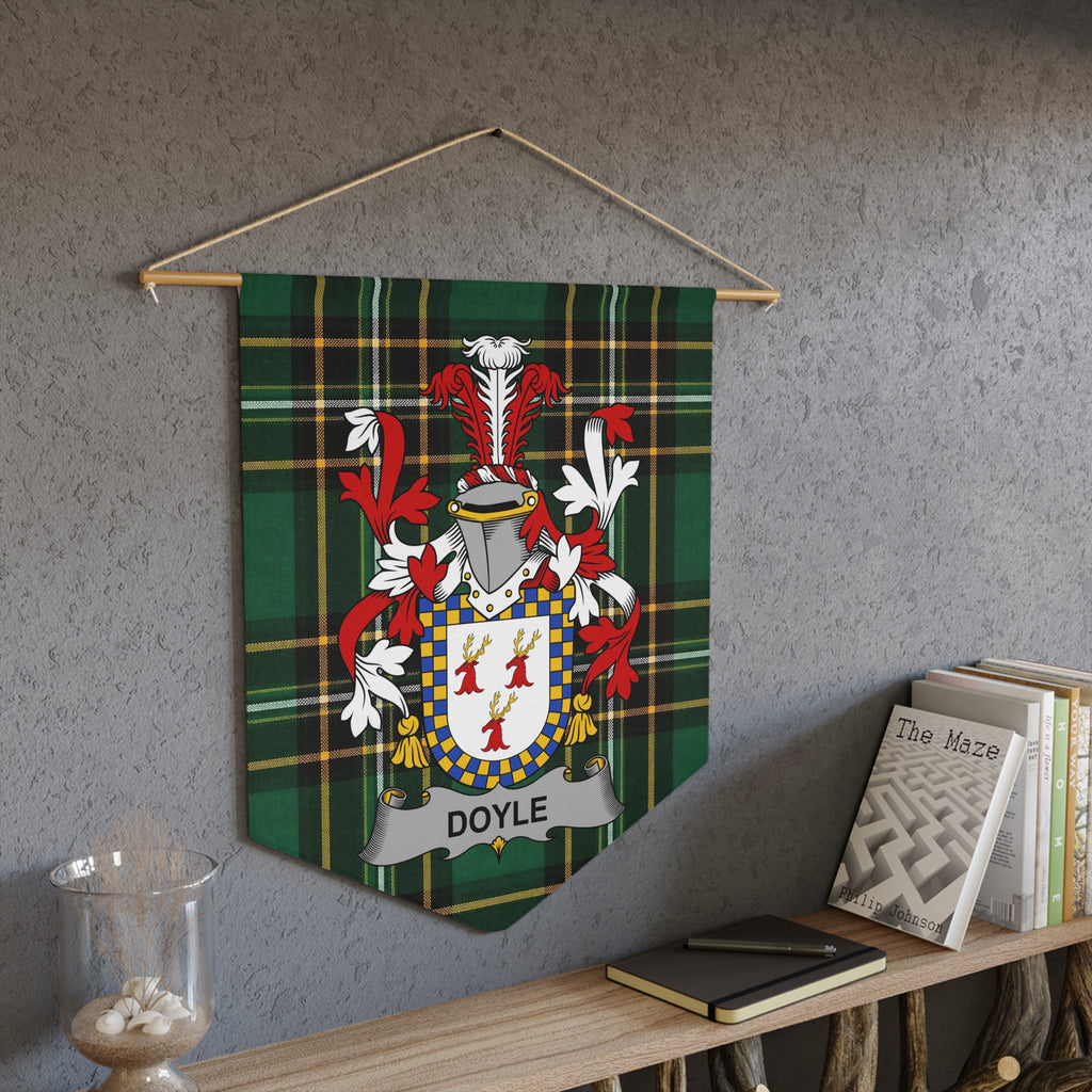Doyle family crest on a green plaid pennant banner hanging on a wall.