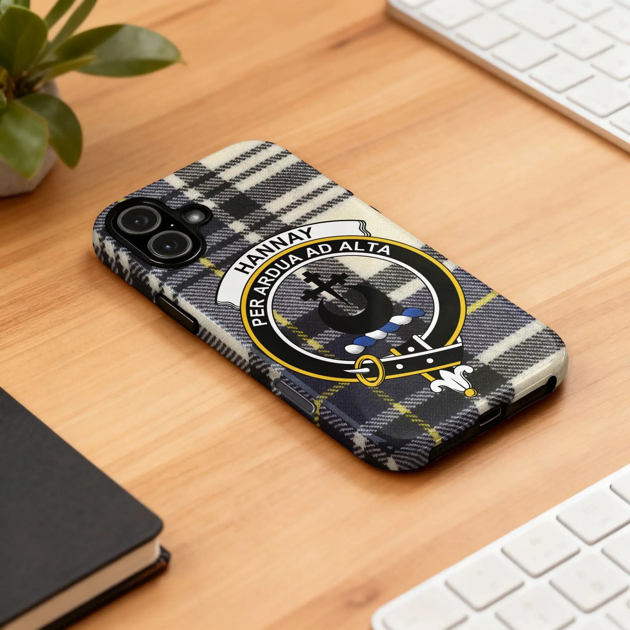 Hannay clan crest and tartan phone case — edge-to-edge design on glossy slim case, side view