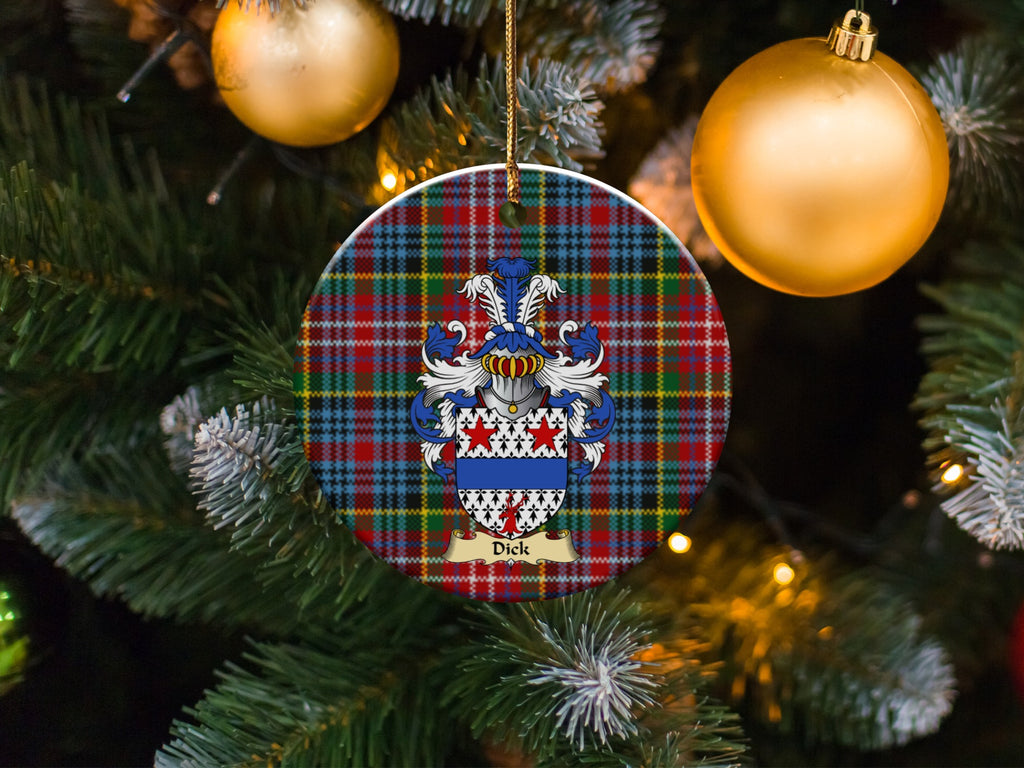 Dick family emblem ceramic Christmas ornament with Caledonia tartan background in festive holiday décor