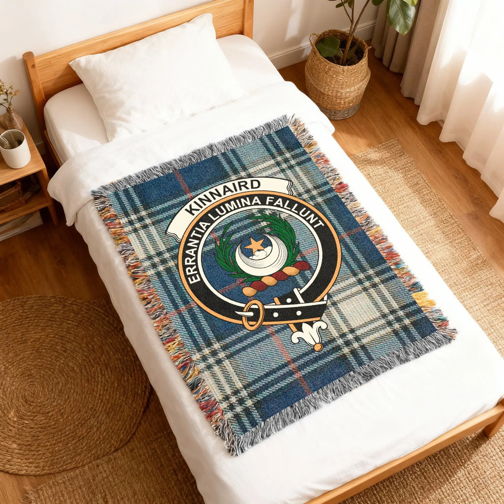 Clan Kinnaird tartan woven blanket — fringe border detail showing woven pattern and clan crest